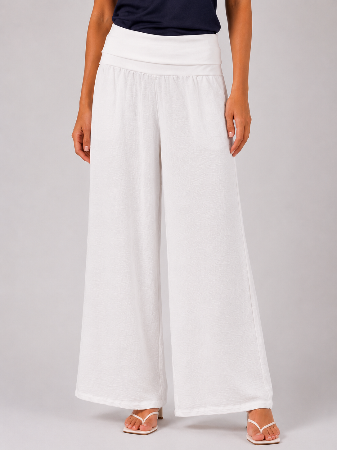 Street-cut sweatpants with a fold-over waistband.