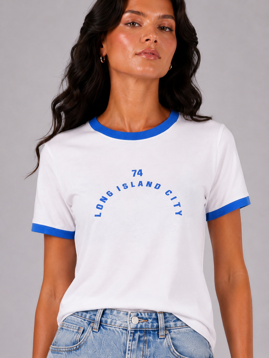 T-shirt with text and the number 74 on the front and back.