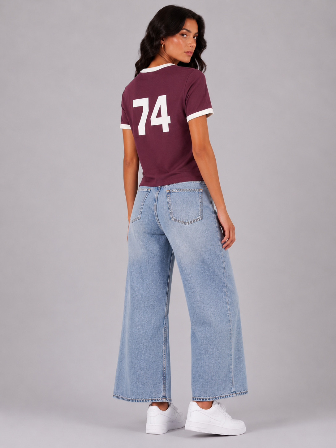 T-shirt with text and the number 74 on the front and back.
