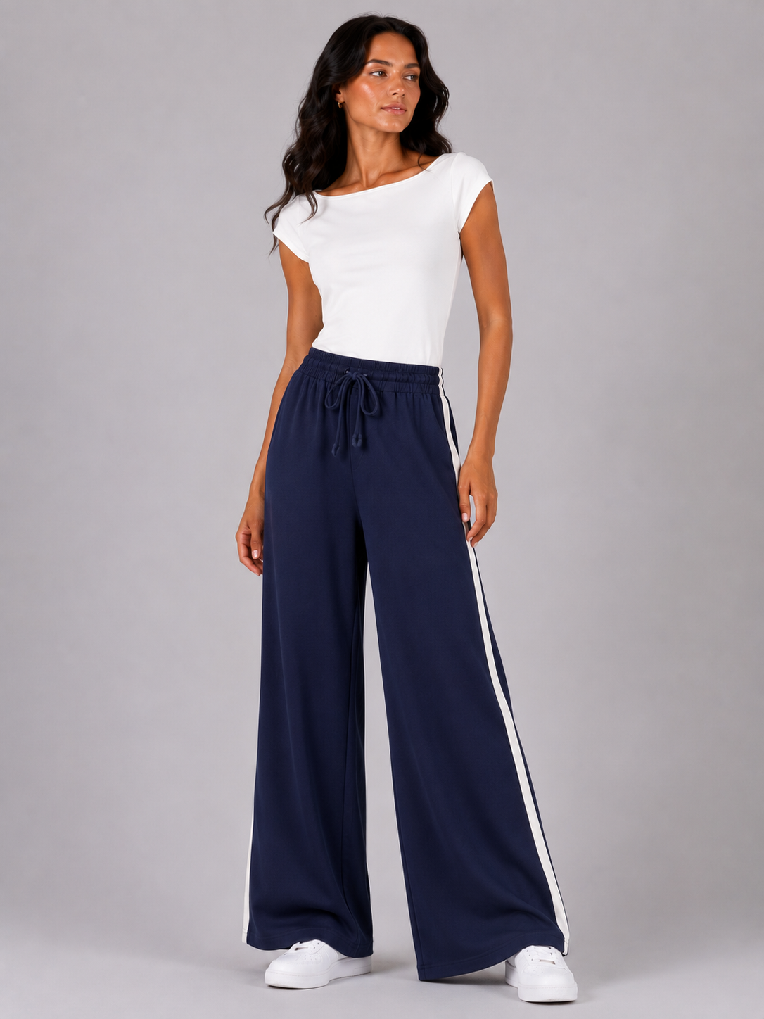 Street-style sweatpants with a white stripe down the sides.