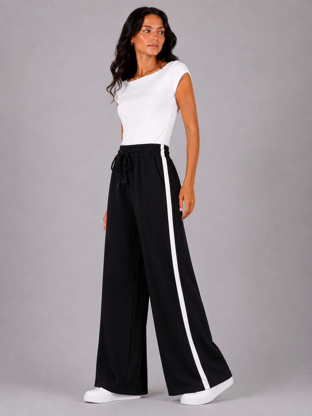 Street-style sweatpants with a white stripe down the sides.