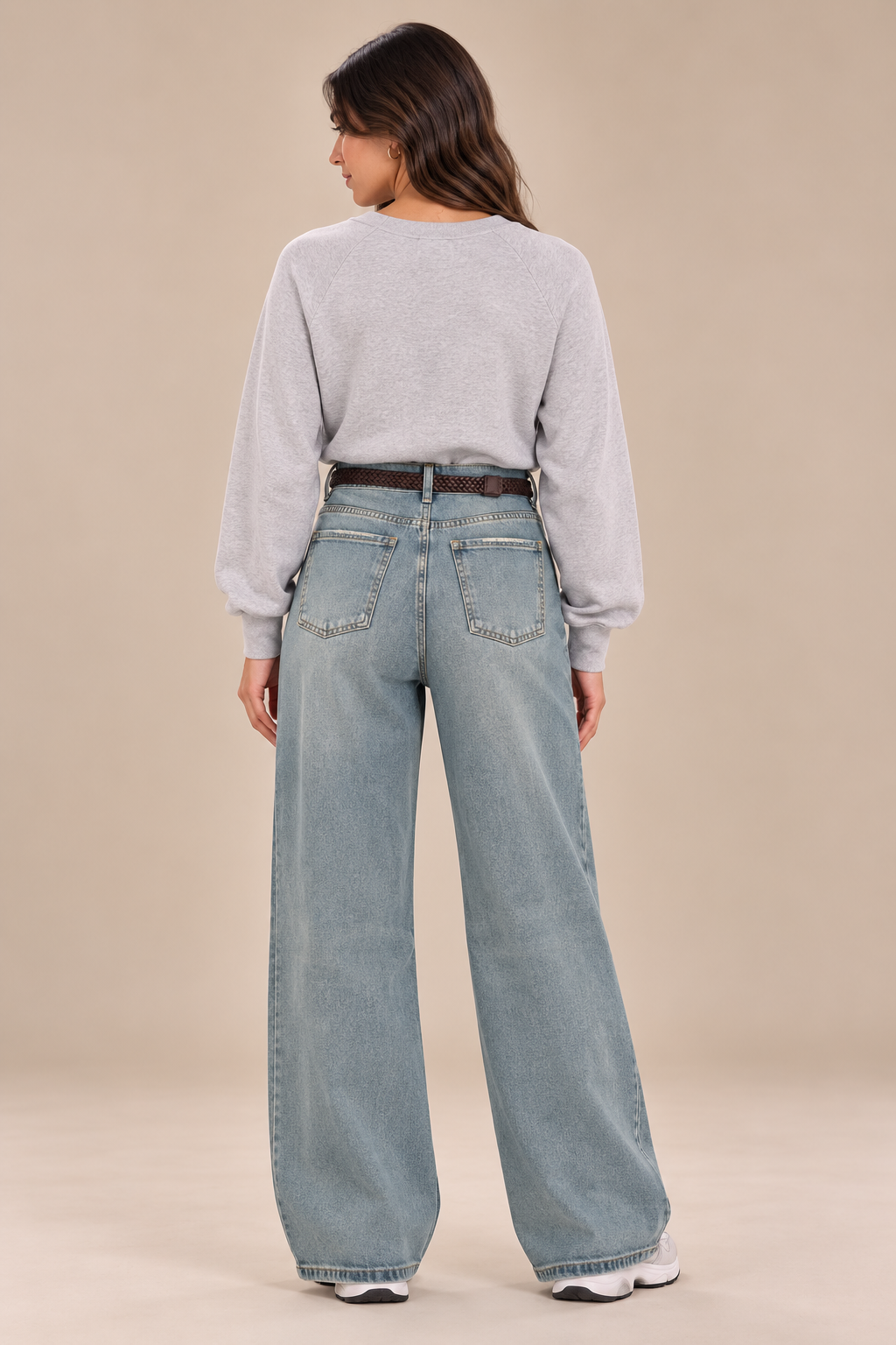 Straight-leg jeans with a brown belt and scarf