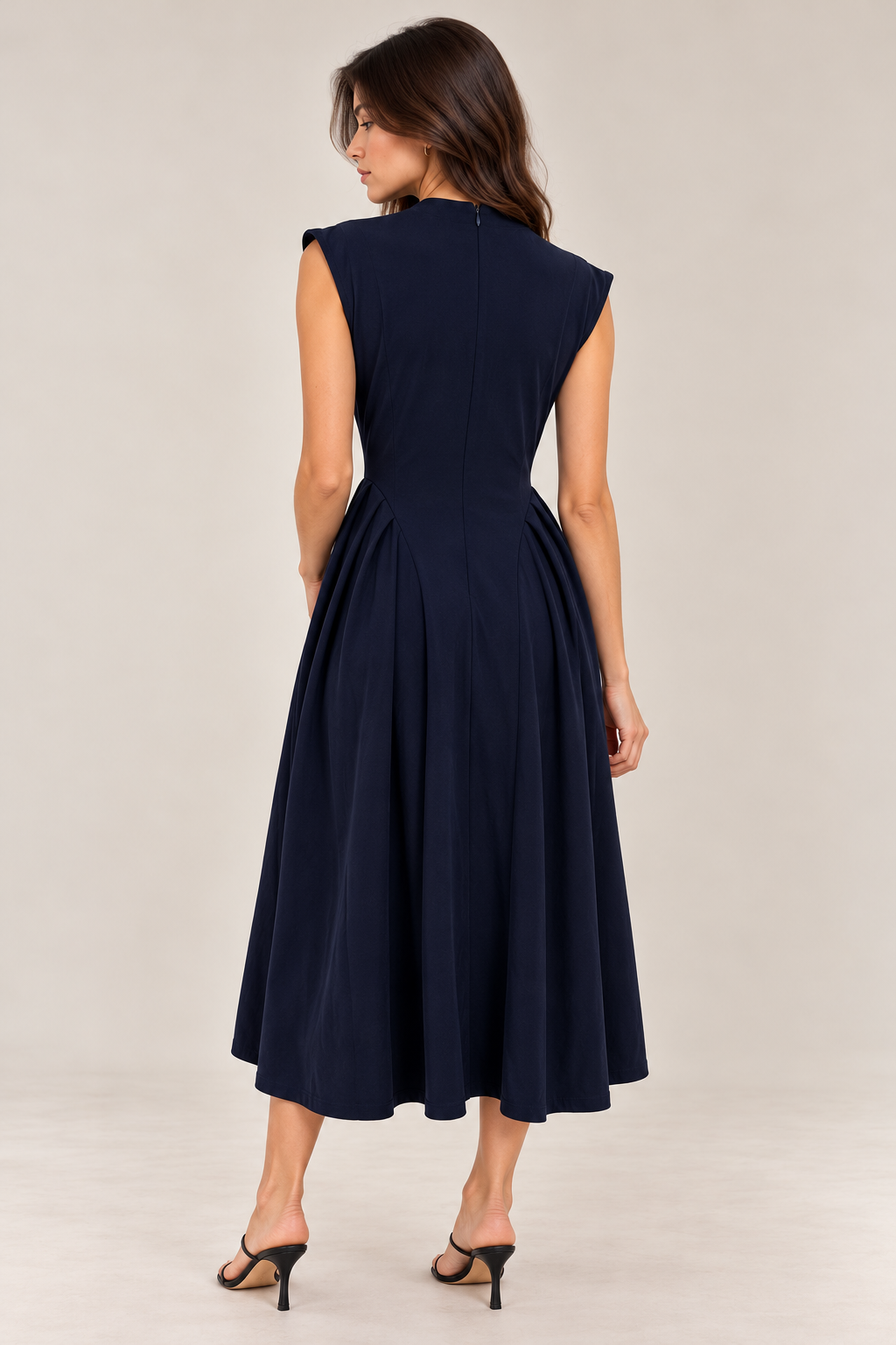 Long dress with a jewel neckline and side ruffles