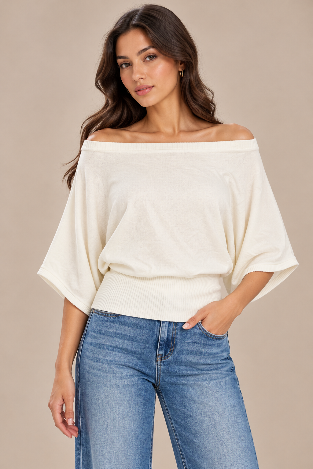 Off-the-shoulder wool blouse with wide cape sleeves
