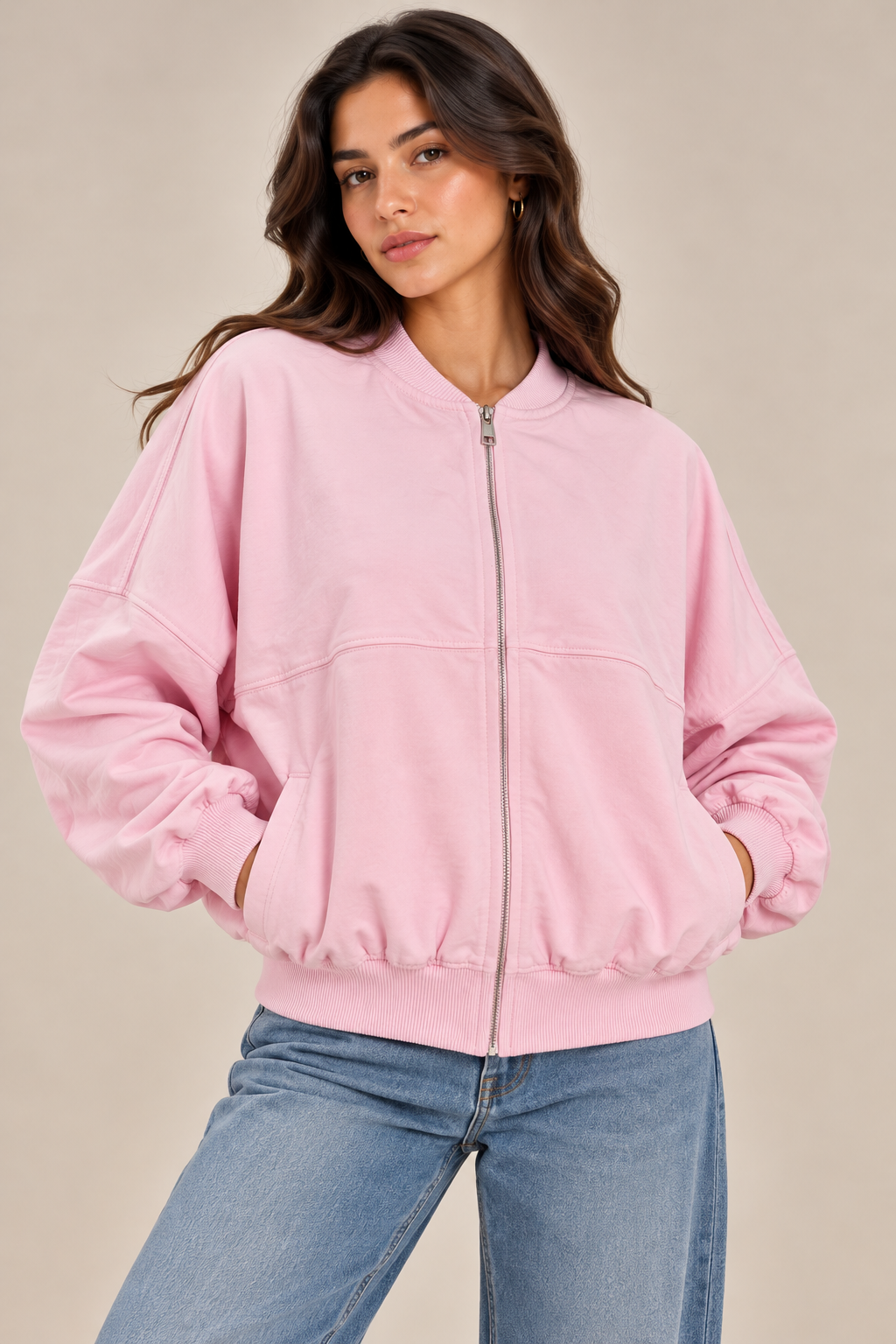Oversized sweatshirt with a center front stripe, zip closure, and front pocket.