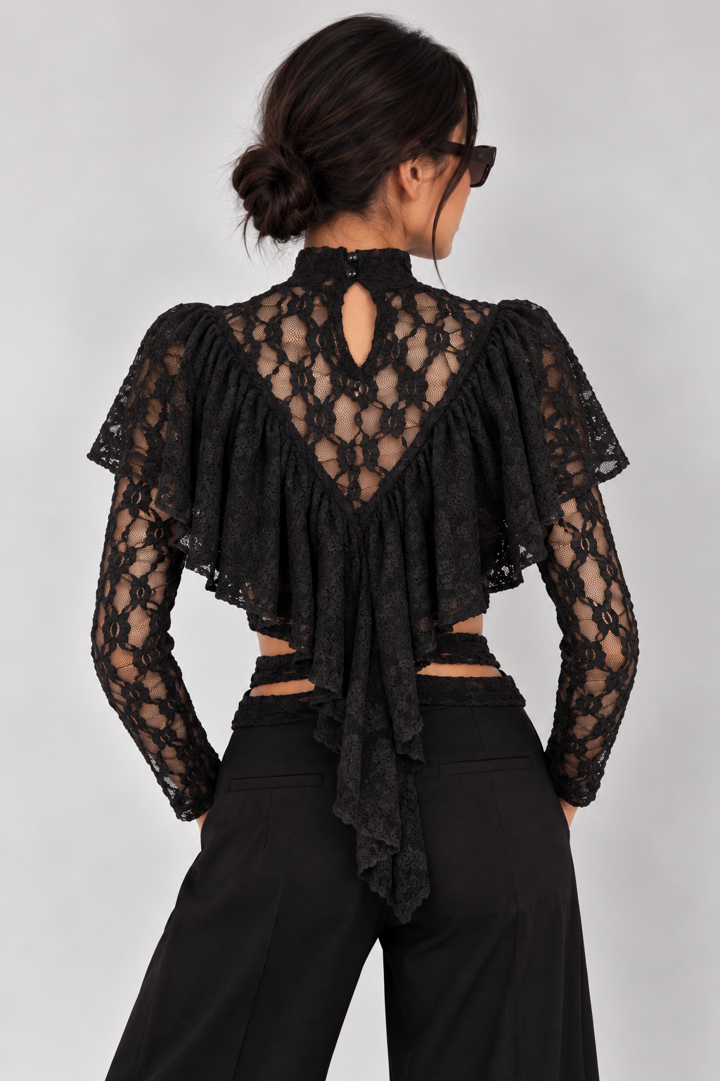 Lace-sleeve top with ruffled bodice and open, tie-front waist