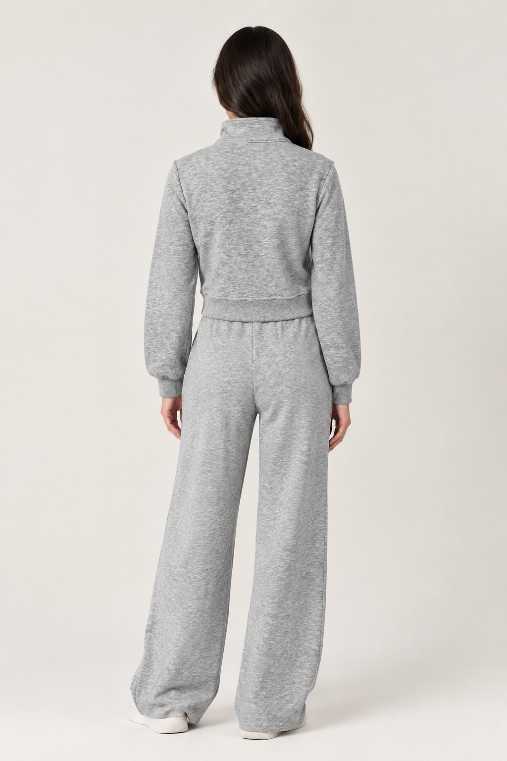 Chinese-style sweatshirt with silver buttons and a zippered front.
