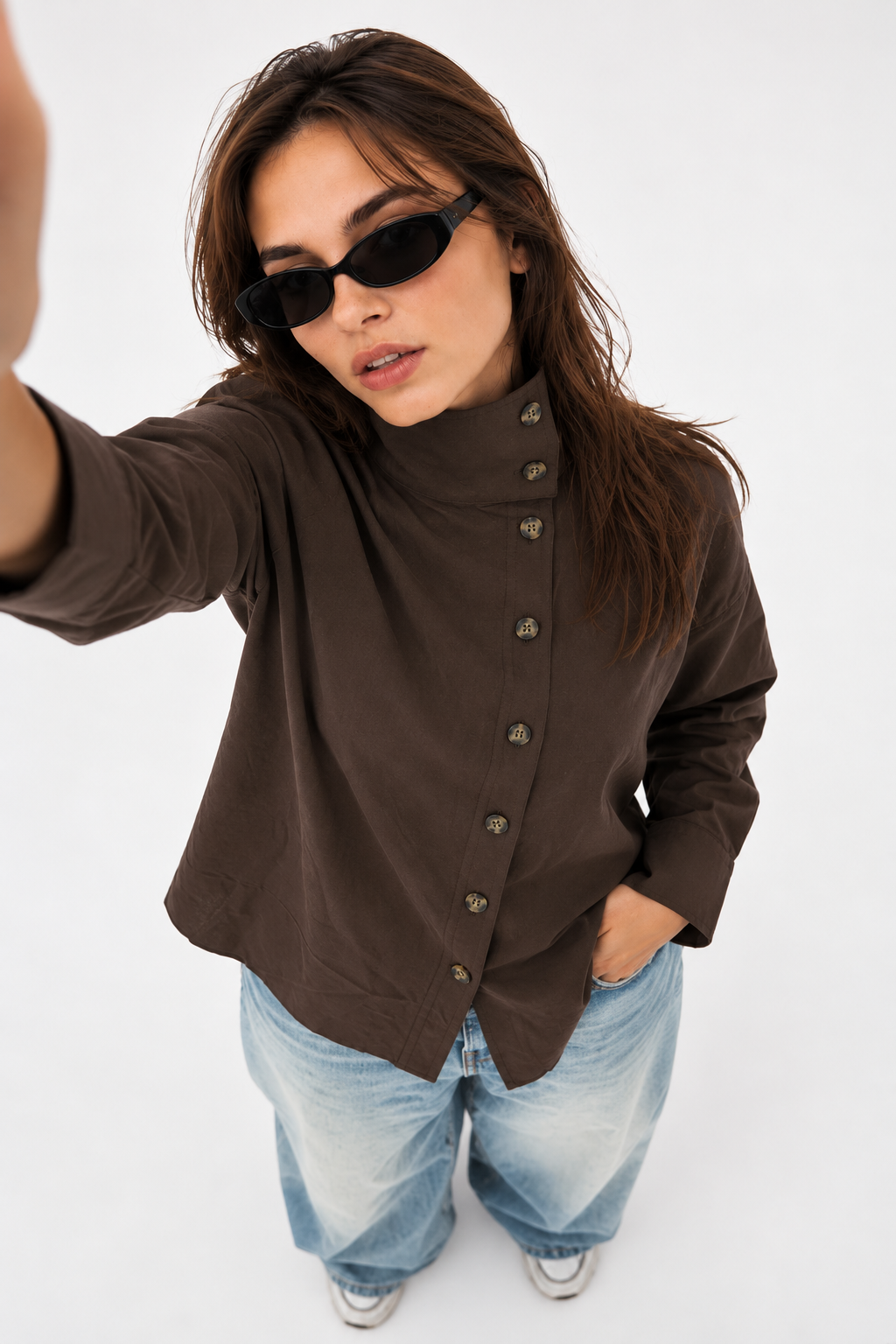 High-neck shirt with buttons and a button-down front.
