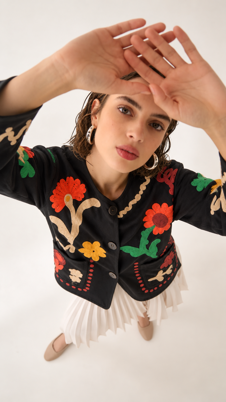 Black jacket with roses and buttons on the chest
