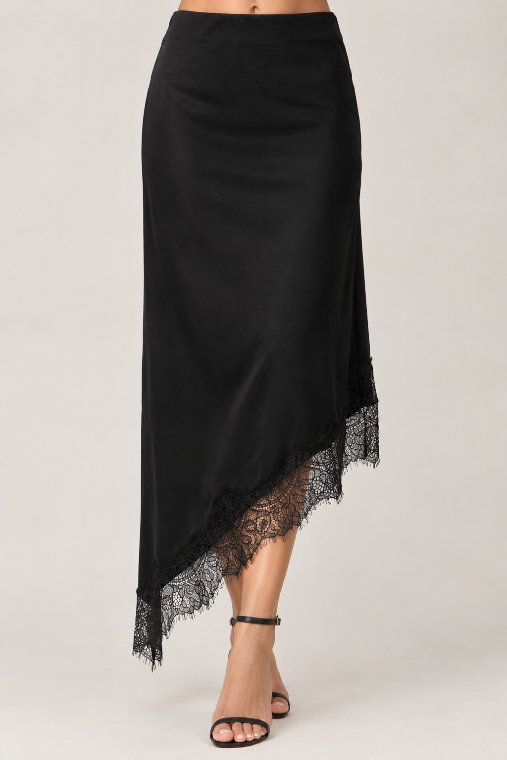 Black satin midi skirt with asymmetrical lace underneath