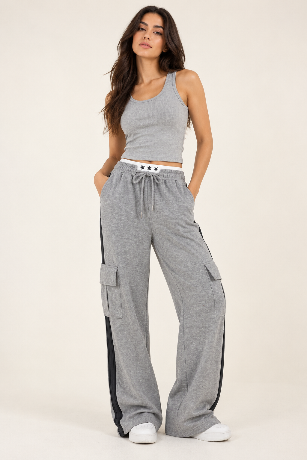 Grey cargo sweatpants with star waist and side stripe