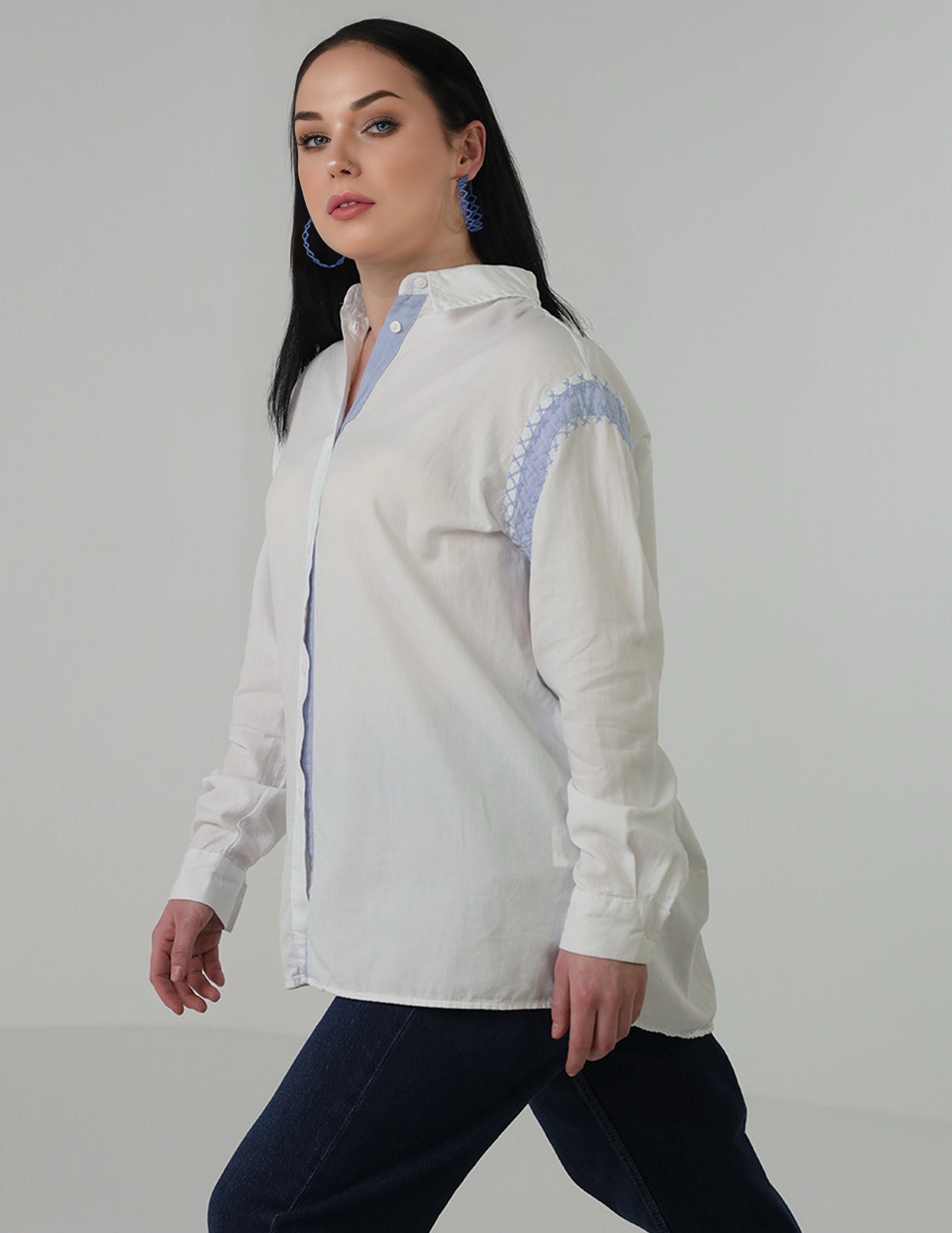 Oversized shirt with embroidery from sleeves