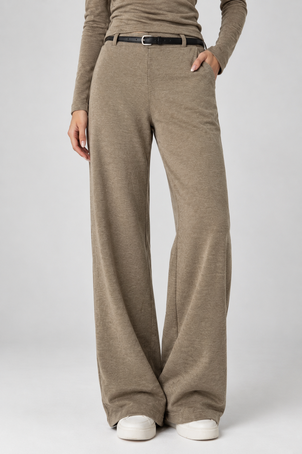 Beige cotton straight-cut trousers with a black belt