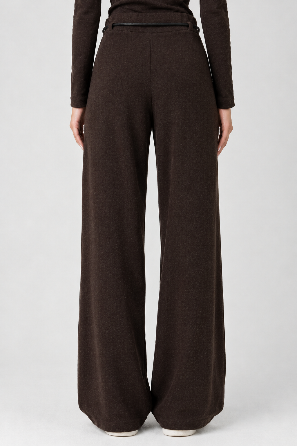 Chocolate brown wool straight-cut trousers with a black belt and gold buckle.