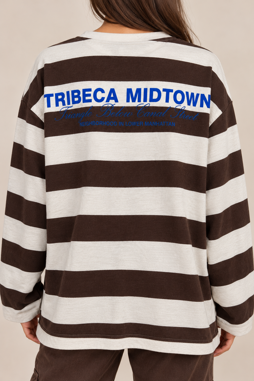 Oversized brown striped blouse with the words "TRIBECA MIDTOWN" in blue on the chest and back.