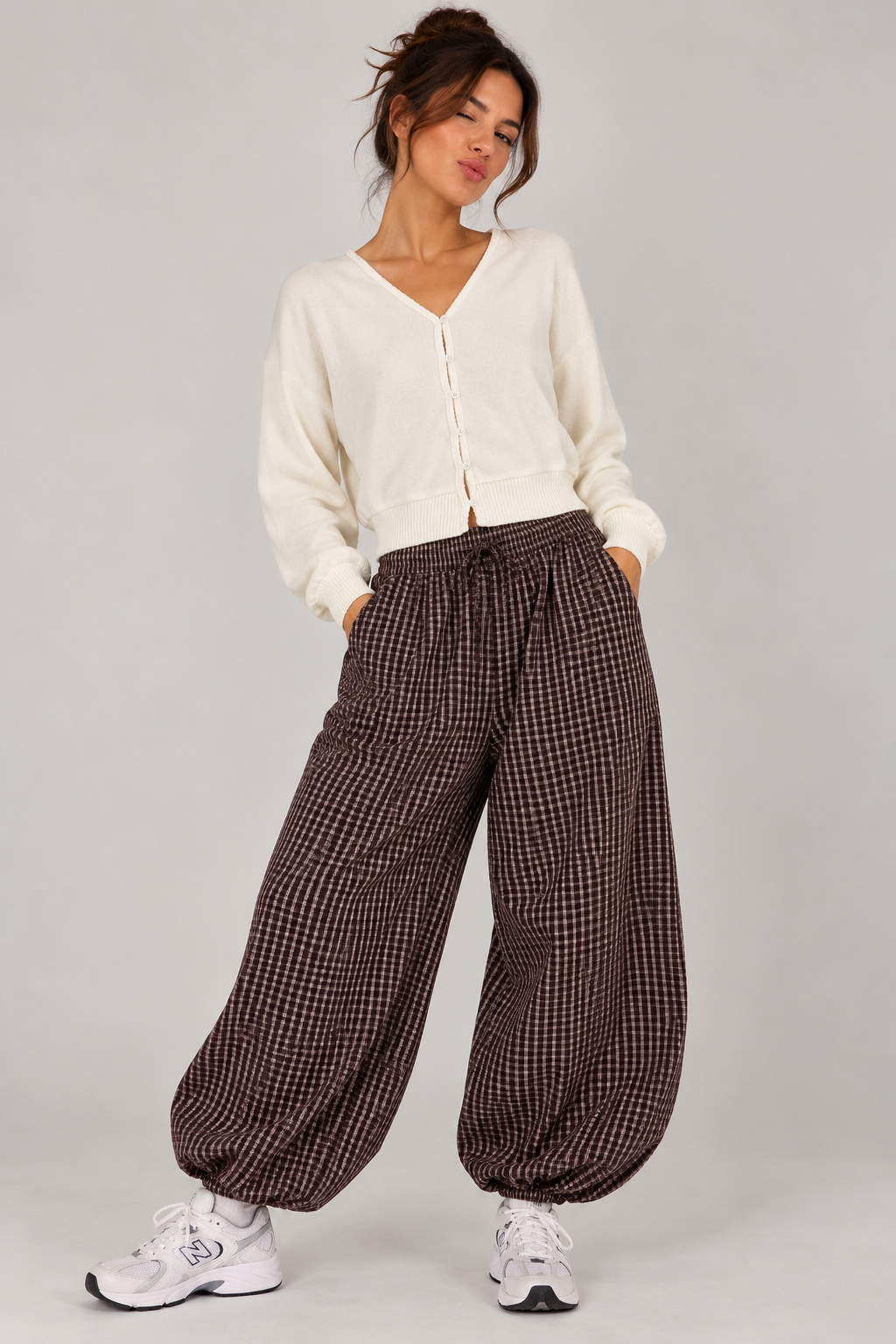 Balloon pants with a burgundy and beige checkered pattern