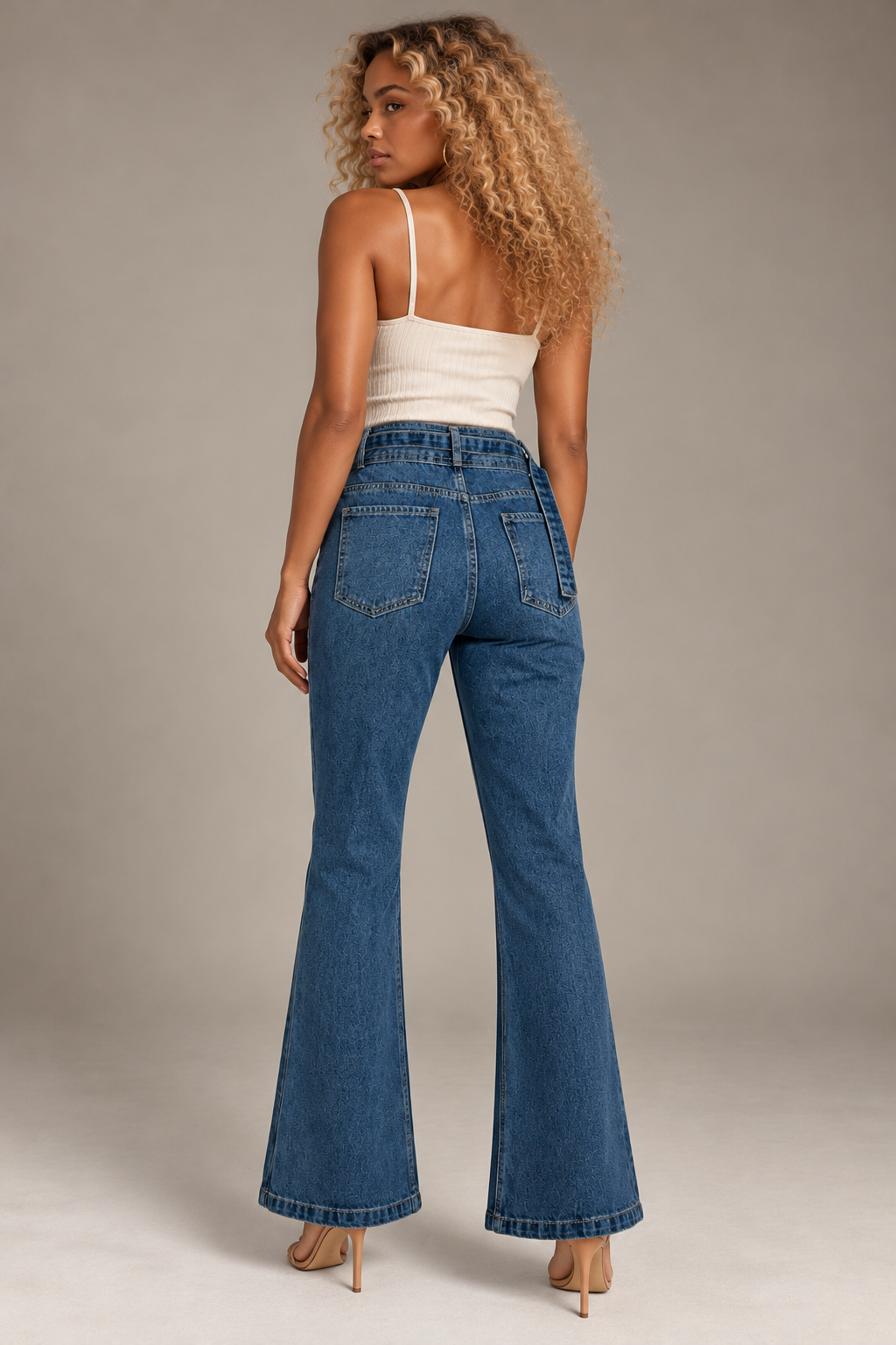 Blue jeans with a center line and a denim belt