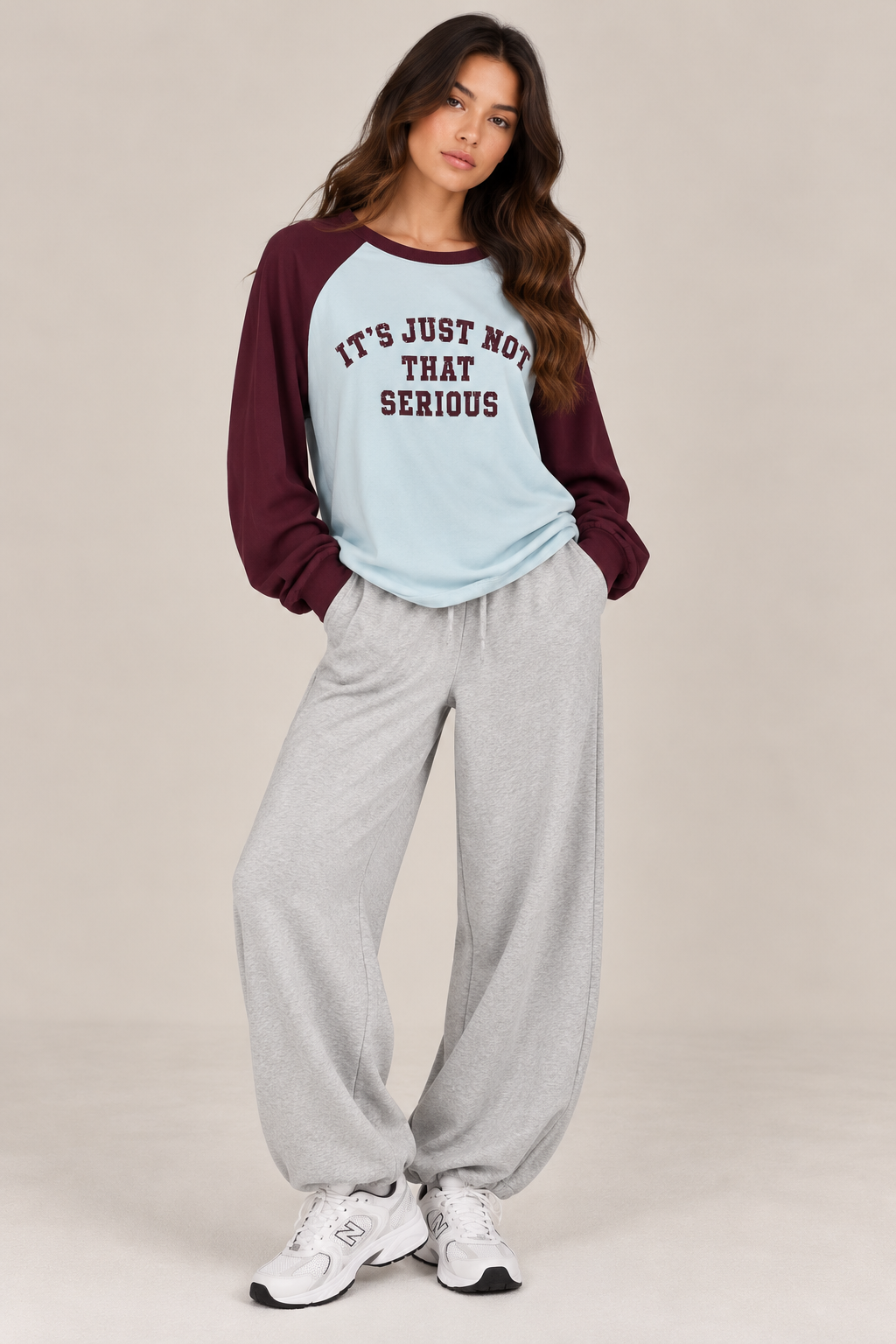 A blouse with burgundy sleeves and a blue top (words)