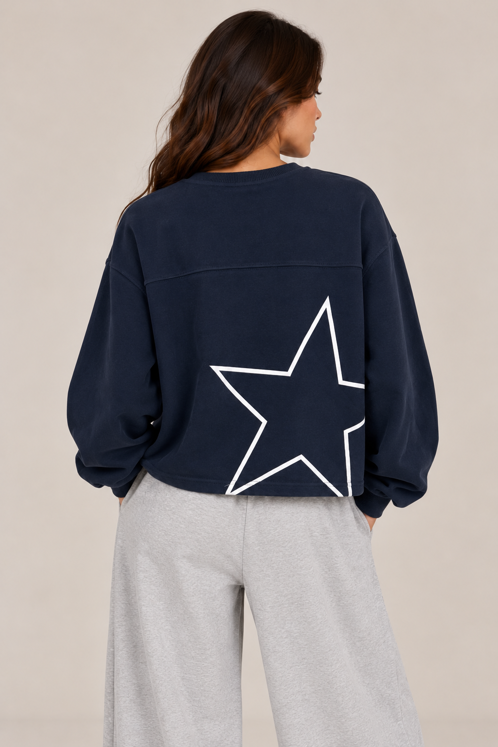 Oversized navy blouse, chest size "76" and star-shaped back.