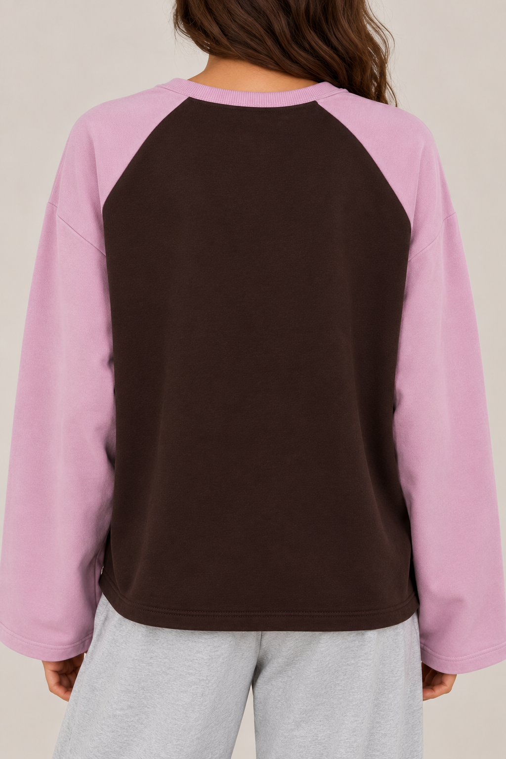 An oversized two-tone blouse featuring the words "Sorry not into fashion today"